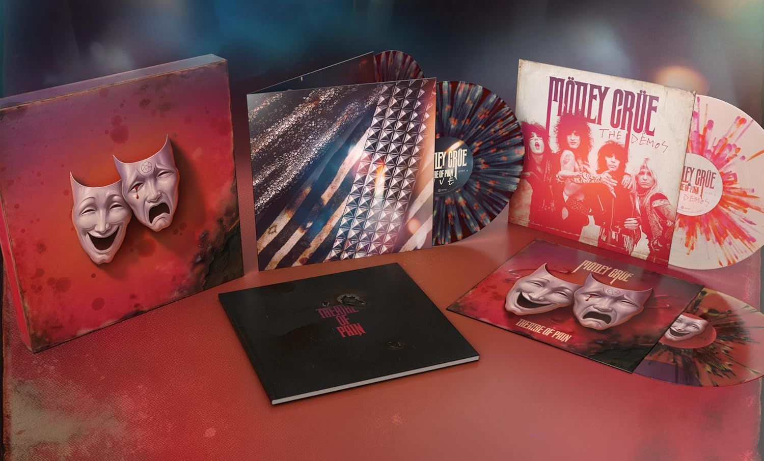 Mötley Crüe Theatre of Pain 40th Anniversary limited deluxe box set featuring the iconic theatrical mask artwork, multiple coloured vinyl LPs including splatter pressings, The Demos sleeve, gatefold jackets and a hardcover book, premium 4LP vinyl box set reissue available from Utopia Records.