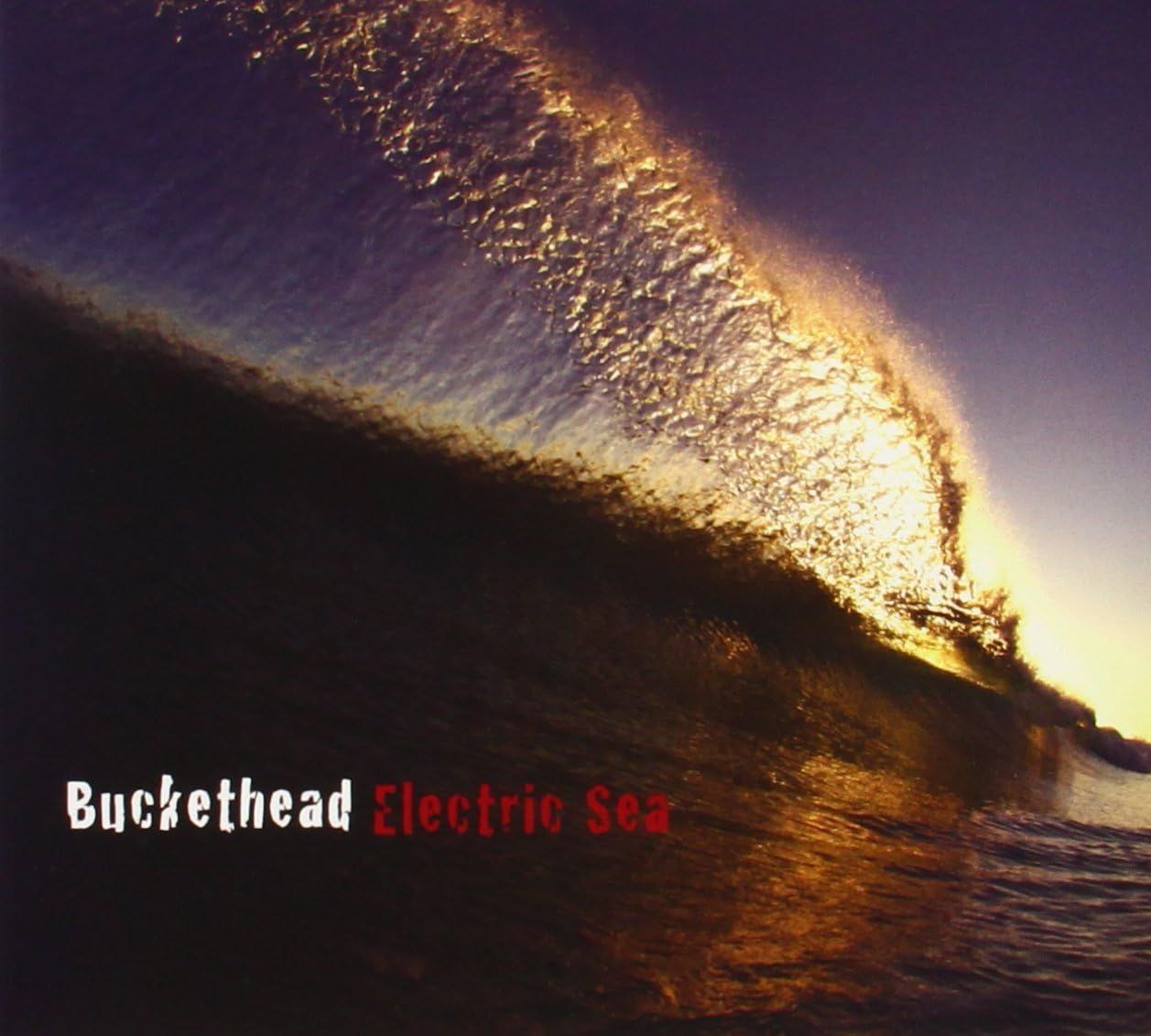 Buckethead Electric Sea album cover featuring a glowing ocean wave lit by golden sunlight against a dark sky, with the Buckethead name in white and Electric Sea title in red, instrumental guitar album artwork available from Utopia Records.