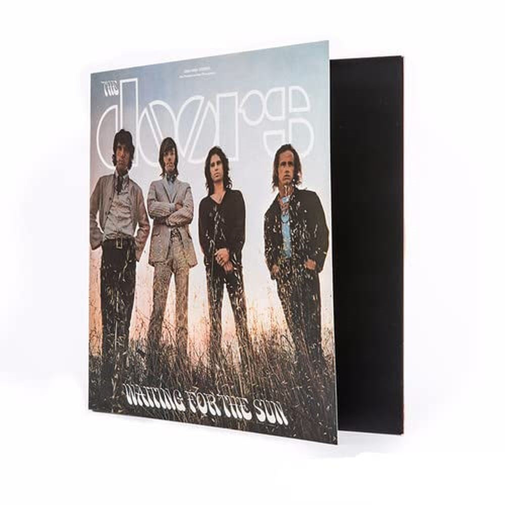 The Doors Waiting for the Sun album cover showing the four band members standing in tall grass under a pale sky, with The Doors logo at the top and album title at the bottom, classic psychedelic rock artwork available from Utopia Records.