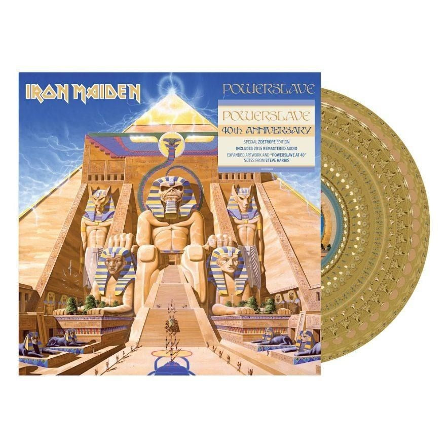 Iron Maiden Powerslave 40th Anniversary album artwork featuring the iconic Egyptian pyramid scene with colossal statues and lightning above, shown with a gold-coloured zoetrope vinyl disc as a special anniversary edition reissue, available from Utopia Records.